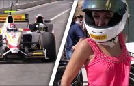 Playmate-rides-in-F1-car-with-Mario-Andretti